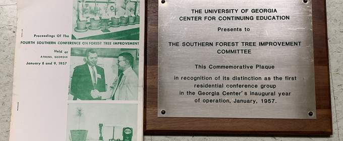 The original 1957 program and plaque